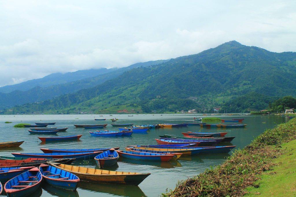 Image of wooden boat available in the phew lake which are used to explore the calm beauty of phewa lake 