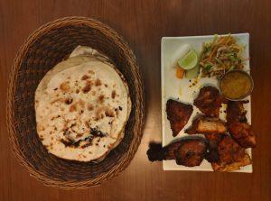 Roti and meat served at Affordable Hotel Janani Pokhara