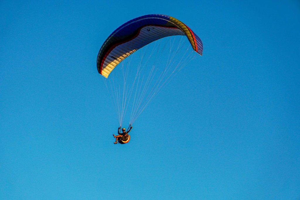 A person Paragliding in pokhara 
