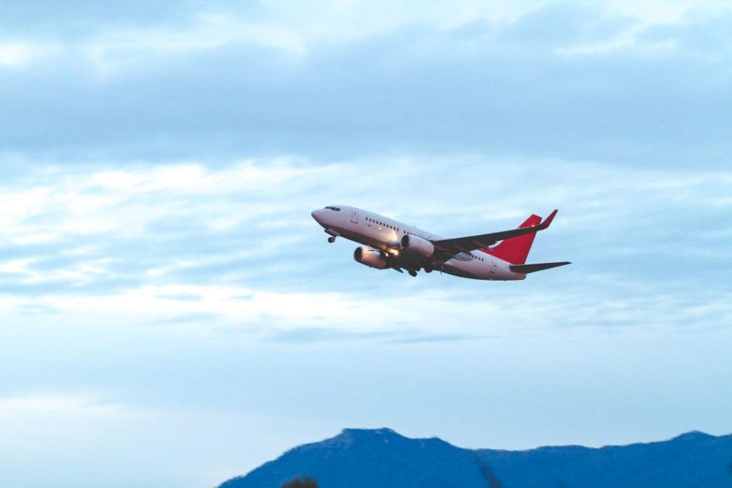Domestic flight from Kathmandu to Pokhara over Nepal's mountains